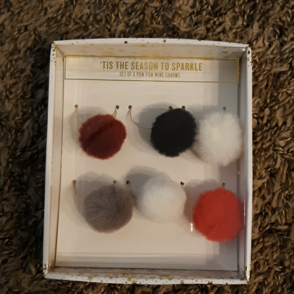 #611 Brand new. Alliteration Wine Charms 6 PC Pom Pom